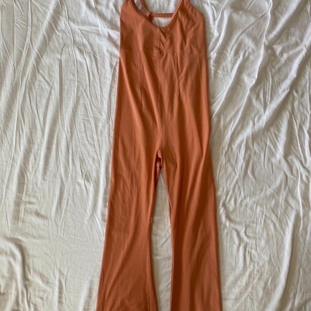 FP Movement One piece romper  * (small pull in the inside of leg thread). Size:M